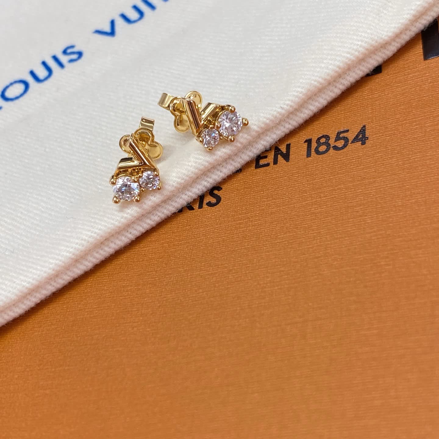 Louis Vuitton Gold Tone Stud Earrings with Clear Stones